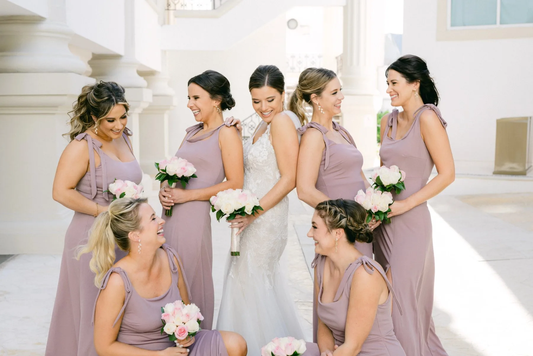Bride and bridesmaids getting ready — bridal makeup and hair by VO evolution in Cancun and the Riviera Maya